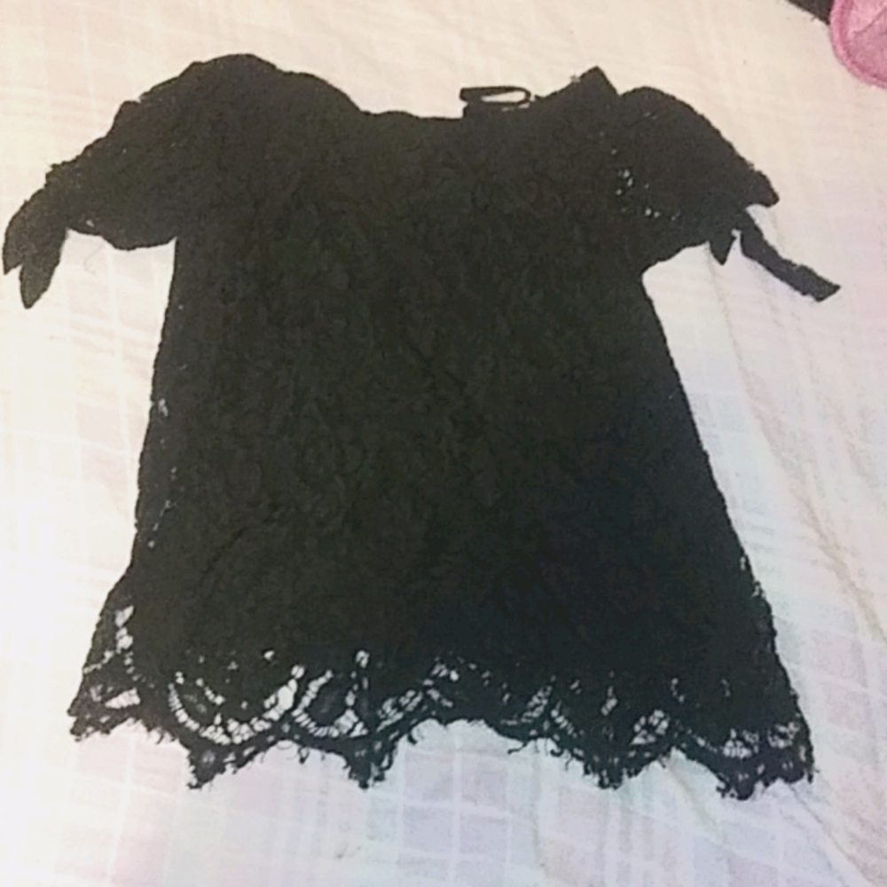 Black lace short sleeve tied shirt.